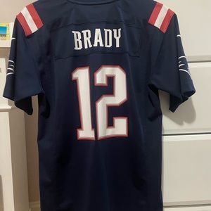 PATRIOTS JERSEY, #12 TOM BRADY ( kids large age 14-16) fits like a woman’s s/m